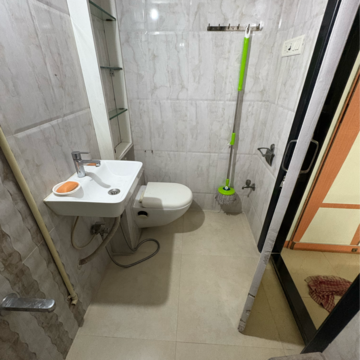 Bathroom in 3 BHK Apartment at Harsh CHS Tilak Nagar, Tilak Nagar – for Rent