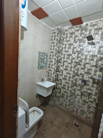 Bathroom in 2 BHK Builder Floor at Dwarka Mor – for Rent