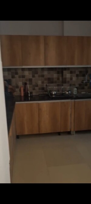 Kitchen in 2 BHK Apartment at Saya Gold Avenue, Vaibhav Khand – for Sale