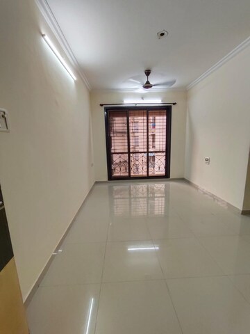 Living Room in 2 BHK Apartment at Nisarg Hyde Park, Kharghar – for Rent