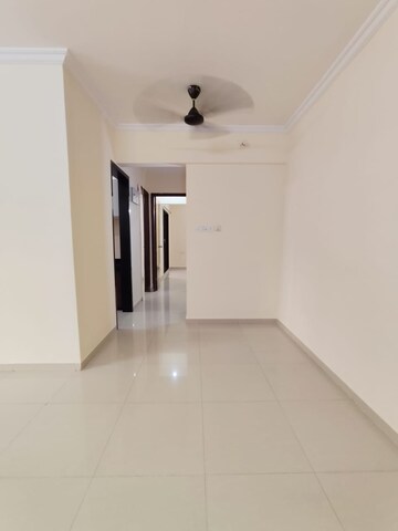 Living Room in 2 BHK Apartment at Nisarg Hyde Park, Kharghar – for Rent