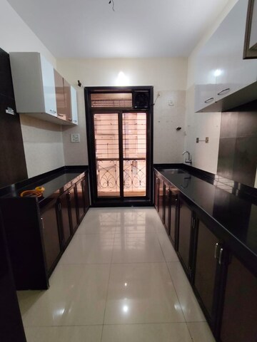Kitchen in 2 BHK Apartment at Nisarg Hyde Park, Kharghar – for Rent