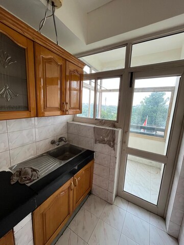 Kitchen in 3 BHK Apartment at Ansal Sushant Estate, Sector 52 – for Rent