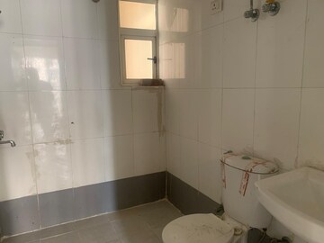 Bathroom in 2 BHK Apartment at Aditya Luxuria Estate, Dasna – for Sale