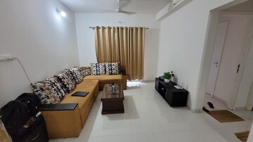 Living Room in 2 BHK Apartment at Godrej Hillside, Mahalunge – for Rent