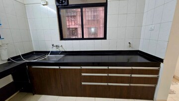Kitchen in 2 BHK Apartment at Nyati Meadows, Wadgaon Sheri – for Rent