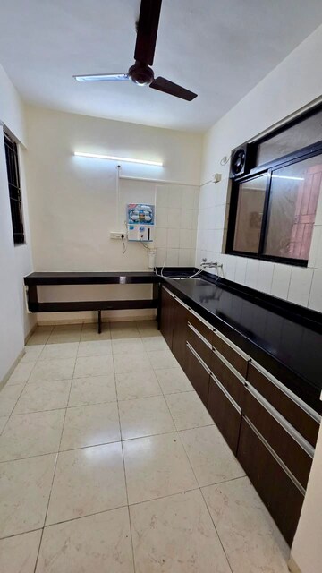 Kitchen in 2 BHK Apartment at Nyati Meadows, Wadgaon Sheri – for Rent