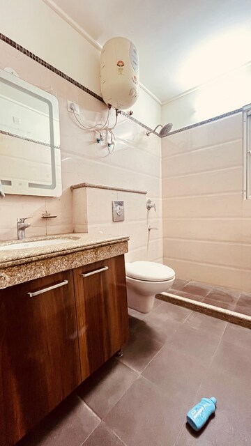Attached Bathroom in 3.5 BHK Apartment at Mahagun Mezzaria, Sector 78 – for Rent