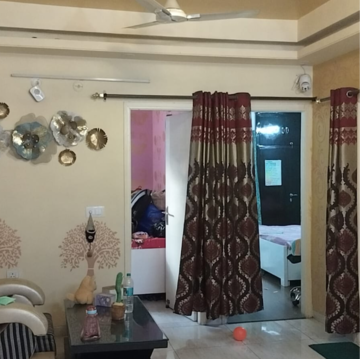 Living Room in 2 BHK Apartment at Ajnara Ambrosia, Sector 118 – for Rent