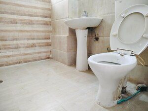 Bathroom in 2 BHK Apartment at Paramount Symphony, Sain Vihar – for Sale