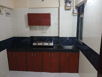 Kitchen in 1 BHK Apartment at Bindra Complex, Andheri East – for Rent