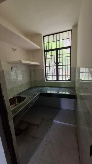 Kitchen in 1.5 BHK Apartment at Sector 10 Greater Noida – for Sale