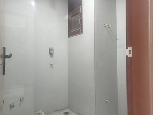 Bathroom in 3 BHK Builder Floor at Mahavir Enclave 1 – for Sale