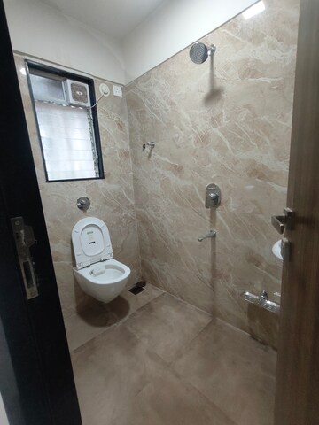 Bathroom in 1 BHK Apartment at Rishabraj Pride, Dahisar West – for Rent
