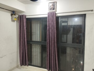 Living Room in 1 BHK Apartment at Lodha Crown Quality Homes, Majiwada – for Rent