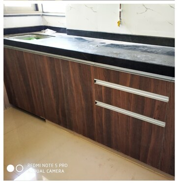 Kitchen in 2 BHK Apartment at Lashkaria Anurag CHS, Andheri West – for Rent