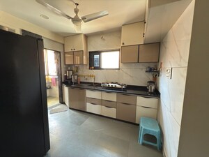 Kitchen in 3 BHK Apartment at Ghatlodia – for Sale