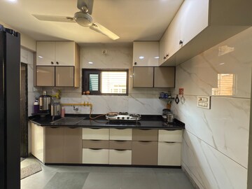 Kitchen in 3 BHK Apartment at Ghatlodia – for Sale