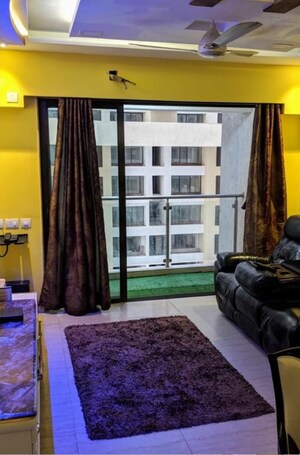 Living Room in 2 BHK Apartment at HDIL Metropolis Residences, Andheri West – for Sale