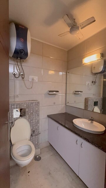 Bathroom in 3 BHK Builder Floor at Kalkaji – for Rent
