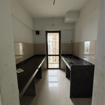 Kitchen in 1 BHK Apartment at Lodha Lakeshore Greens, Hedutane – for Rent