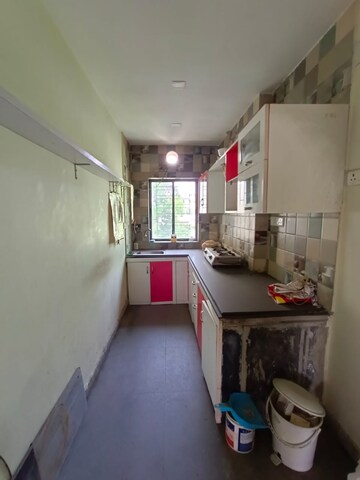 Kitchen in 3 BHK Apartment at Pabitra Gourav Garden, Behala – for Sale