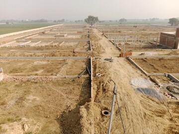 Plot Area in  Plot at Dhanauli – for Sale