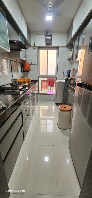Kitchen in 2 BHK Apartment at Dharti Pressidio, Kandivali West – for Sale