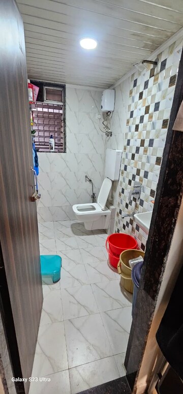 Bathroom in 2 BHK Apartment at Dharti Presidio, Malad West – for Sale