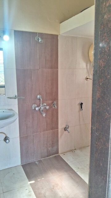 Bathroom in 1 BHK Apartment at Puraniks City Reserva, Ghodbunder Road – for Rent