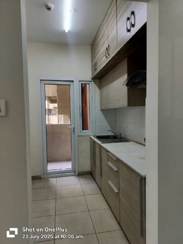 Kitchen in 2 BHK Apartment at Bhartiya Nikoo Homes, Thanisandra Main Road – for Rent