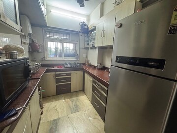 Kitchen in 3 BHK Apartment at V V A Vision Avarsekar Heights, Worli – for Rent