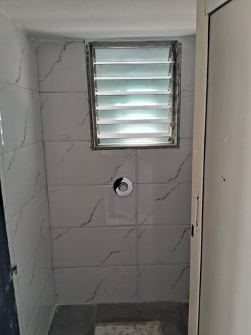 Bathroom in 2 BHK Apartment at Chandak Cornerstone, Worli – for Rent