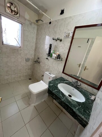 Bathroom in 3 BHK Apartment at Unitech Palms, South City 1 – for Rent