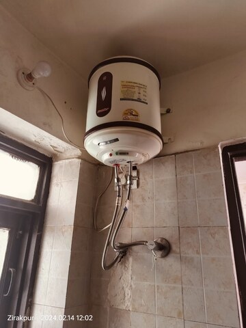 Bathroom in Studio Apartment at Jaipurias Sunrise Greens Zirakpur, Vip Road – for Rent
