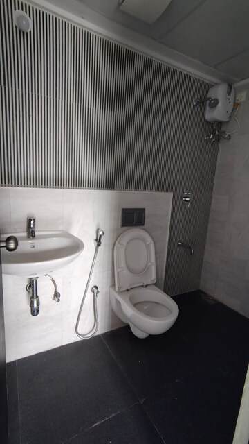 Bathroom in 1 BHK Apartment at Lodha Downtown, Dombivli East – for Rent