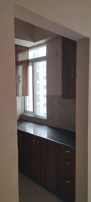 Kitchen in 2 BHK Apartment at Shri Radha Sky Gardens, Sector 16b Greater Noida – for Sale