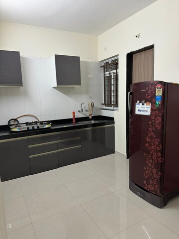Kitchen in 2 BHK Apartment at Little Earth Apartments, Mamurdi – for Sale