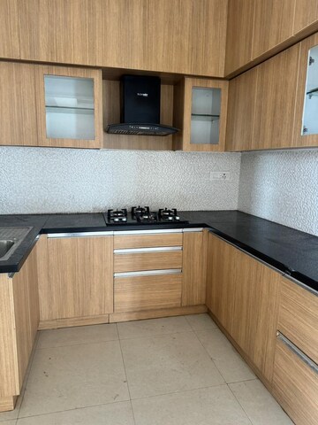 Kitchen in 3 BHK Apartment at Pashmina Waterfront, Old Madras Road – for Rent
