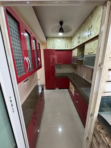 Kitchen in 3 BHK Apartment at Shri Radha Sky Gardens, Sector 16b Greater Noida – for Sale
