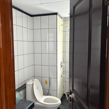 Bathroom in 3 BHK Apartment at Unitech Uniworld Gardens, Islampur – for Rent