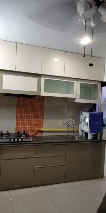 Kitchen in 3 BHK Apartment at Siddhi Aarohi Elysium, South Bopal – for Sale
