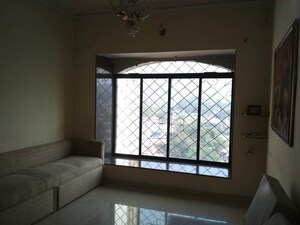 Room in 1 BHK Apartment at Satellite Garden, Goregaon East – for Sale