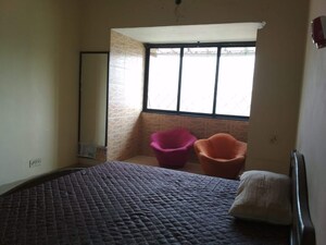Bedroom in 1 BHK Apartment at Satellite Garden, Goregaon East – for Sale