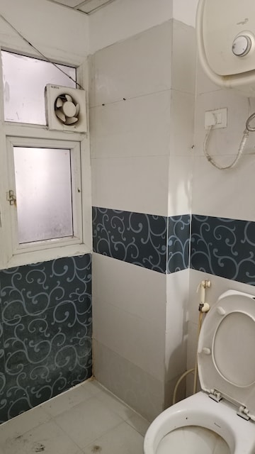 Bathroom in 3 BHK Apartment at Antriksh Golf View, Sector 78 – for Rent