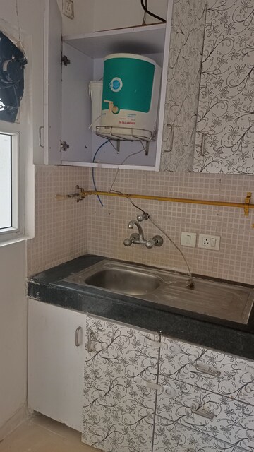 Kitchen in 3 BHK Apartment at Antriksh Golf View, Sector 78 – for Rent