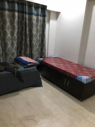 Bedroom in 2 BHK Apartment at Omkar Meridia, Kurla West – for Rent