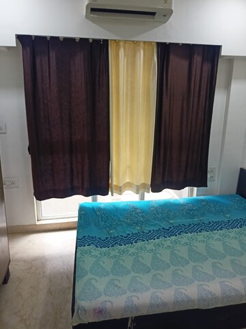 Master Bedroom in 2 BHK Apartment at Omkar Meridia, Kurla West – for Rent