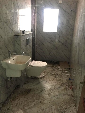 Bathroom in 4 BHK Apartment at Punjabi Para – for Sale