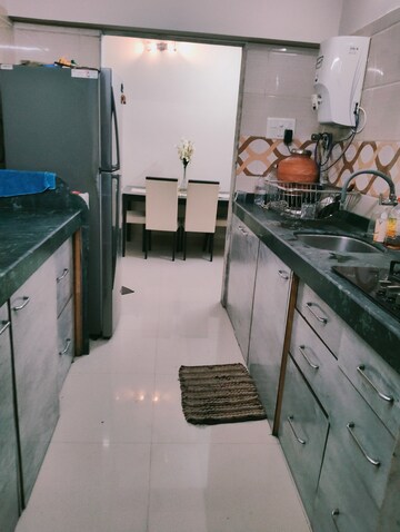 Kitchen in 2 BHK Apartment at Raj Spaces Apartment, Goregaon West – for Rent